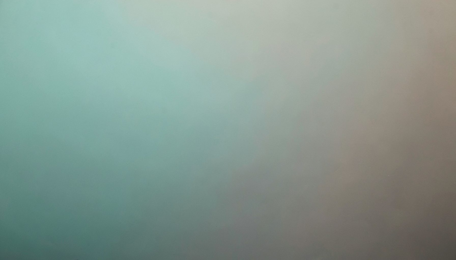 Soft gradient of muted teal and warm gray, evoking introspection and calm self-awareness
